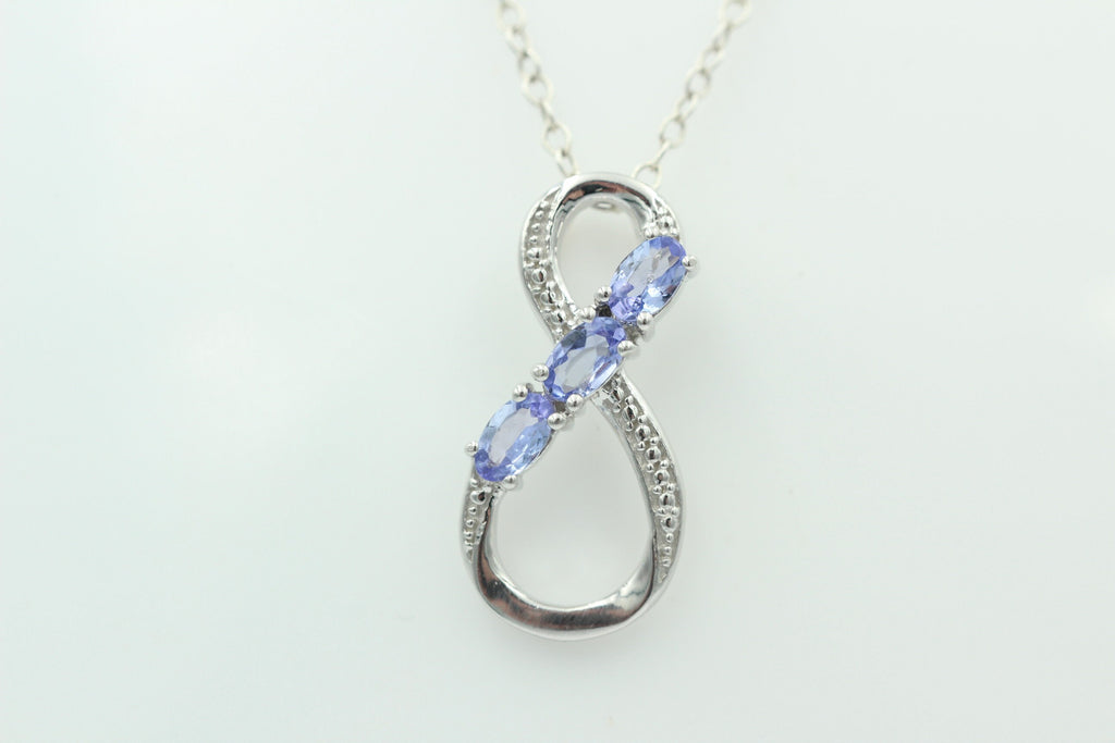 0,72 Carat Tansanit Anhänger Unendlichkeit 925 Silber  Infinity Tansanit aus Afrika