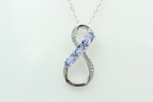 0,72 Carat Tansanit Anhänger Unendlichkeit 925 Silber  Infinity Tansanit aus Afrika