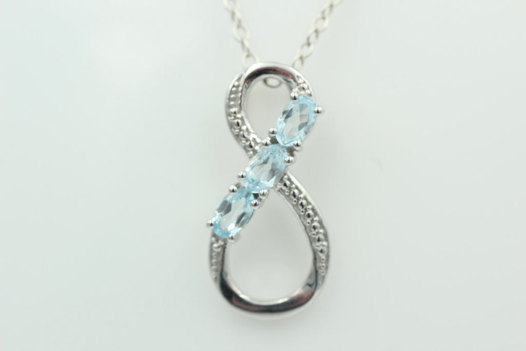 0,72 Carat Blautopas Anhänger Unendlichkeit 925 Silber Infinity