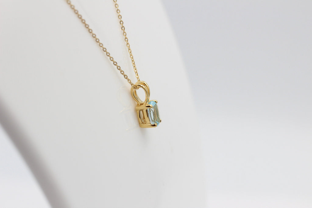 0,78 Carat leuchtender Blautopas Anhänger 925 Silber Collier Kette vergoldet