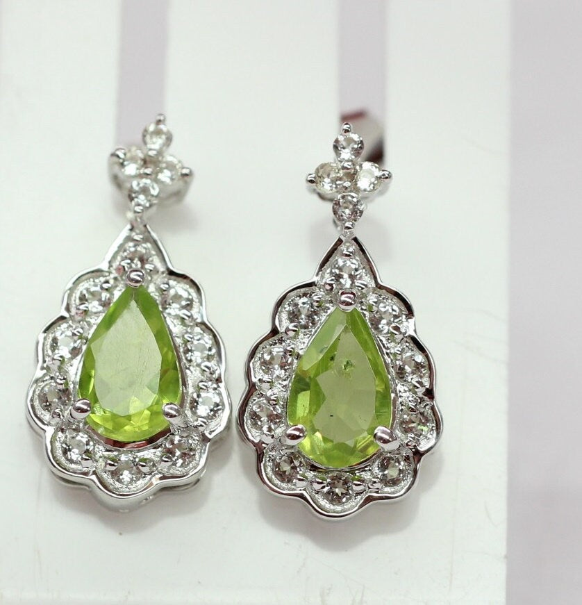 Edler 1,08 Carat Peridot weisstopas Ohrstecker 925 Silber maigraner Olivin Topas