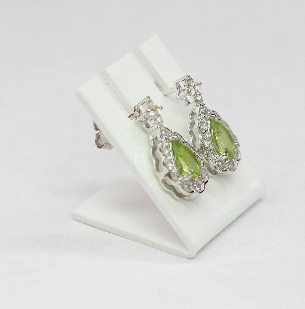 Edler 1,08 Carat Peridot weisstopas Ohrstecker 925 Silber maigraner Olivin Topas