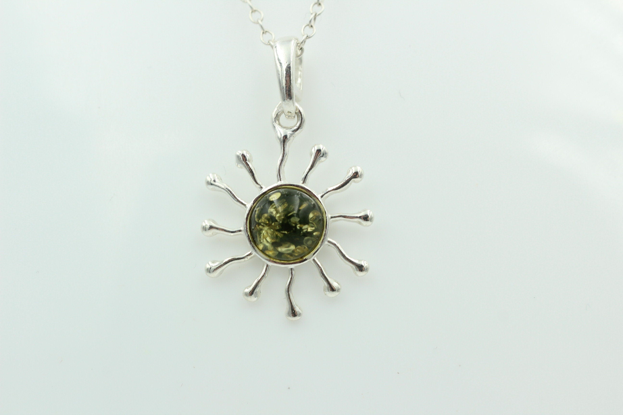 Bernstein Anhänger Sternschmuck in Sterling Silber grüner Bernstein Anhänger