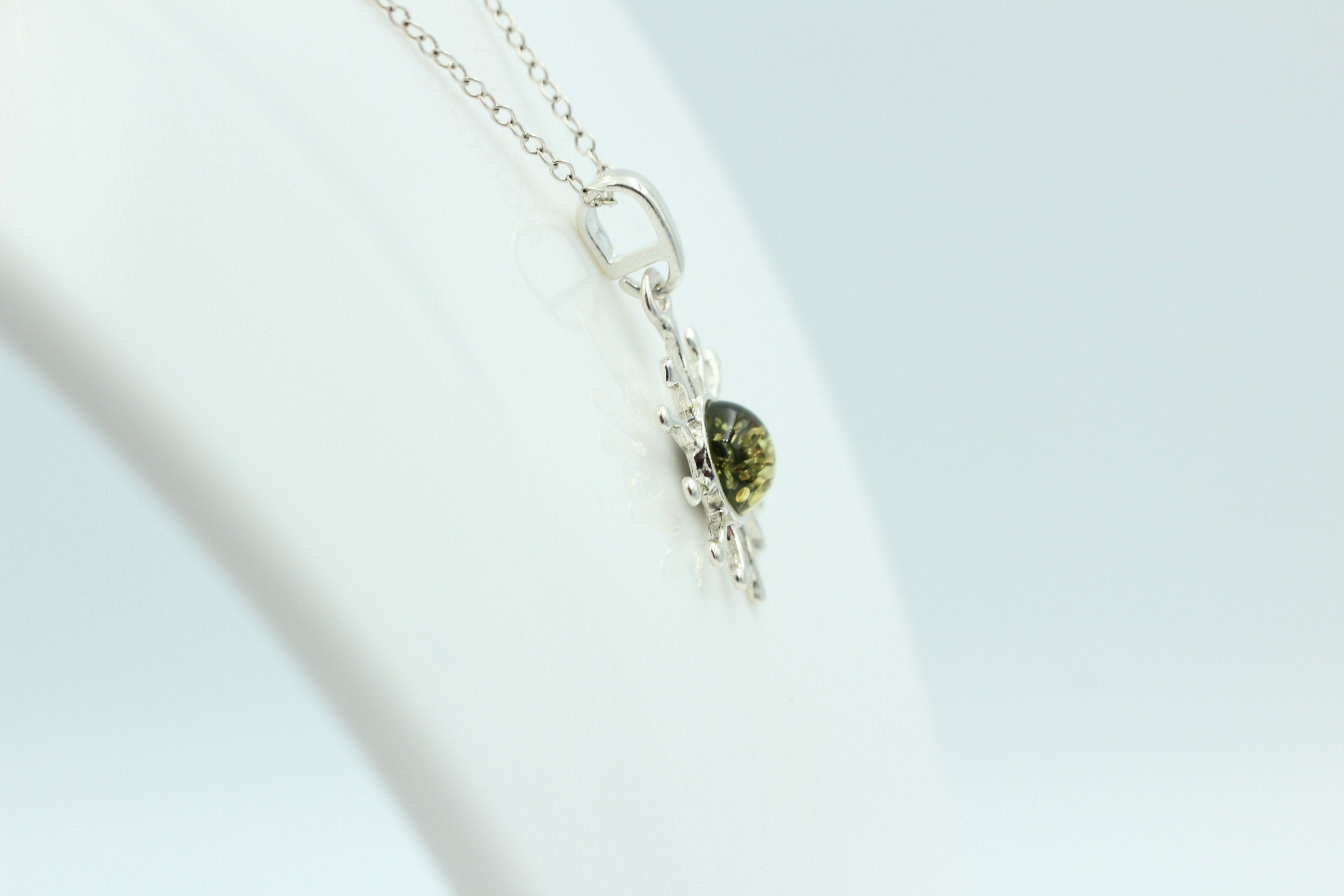 Bernstein Anhänger Sternschmuck in Sterling Silber grüner Bernstein Anhänger