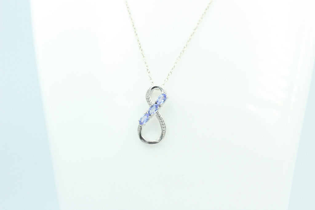 0,72 Carat Tansanit Anhänger Unendlichkeit 925 Silber  Infinity Tansanit aus Afrika