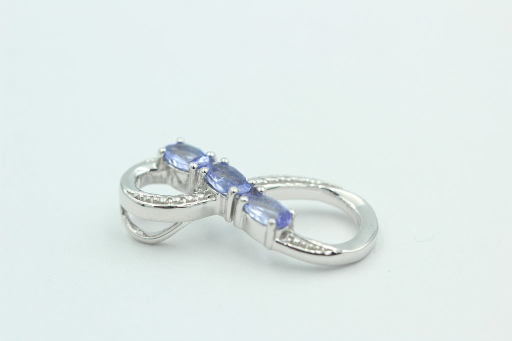 0,72 Carat Tansanit Anhänger Unendlichkeit 925 Silber  Infinity Tansanit aus Afrika