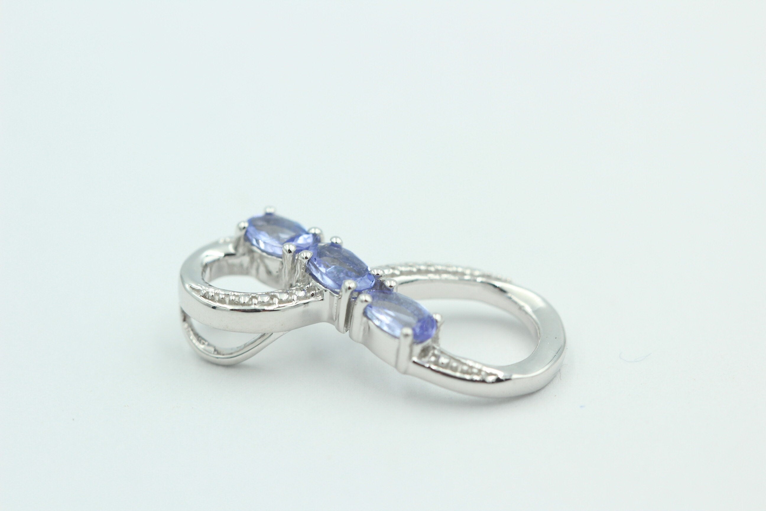 0,72 Carat Tansanit Anhänger Unendlichkeit 925 Silber  Infinity Tansanit aus Afrika
