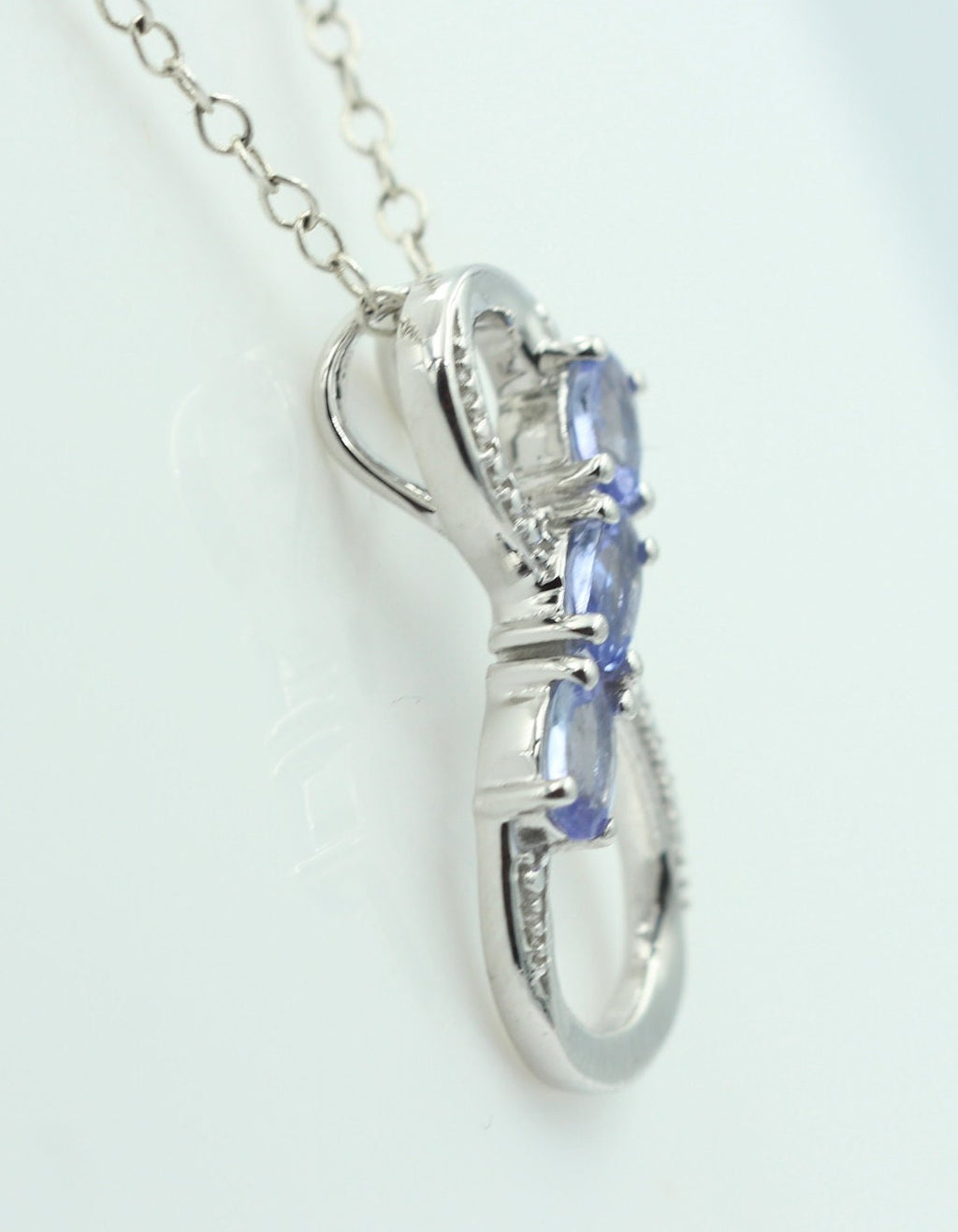 0,72 Carat Tansanit Anhänger Unendlichkeit 925 Silber  Infinity Tansanit aus Afrika