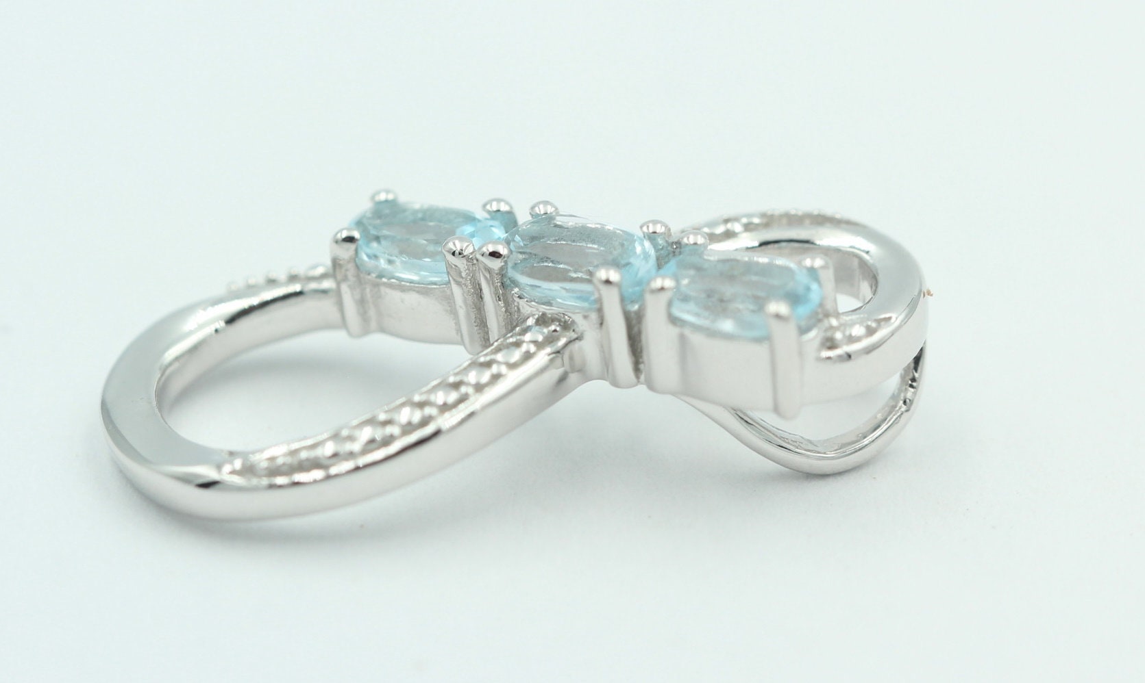 0,72 Carat Blautopas Anhänger Unendlichkeit 925 Silber Infinity