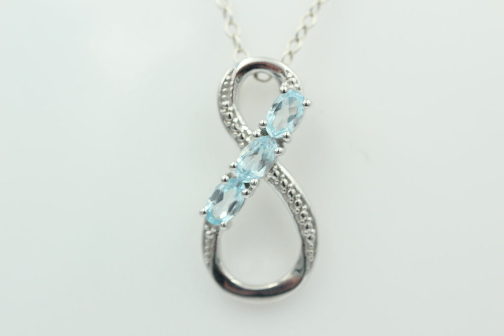 0,72 Carat Blautopas Anhänger Unendlichkeit 925 Silber Infinity