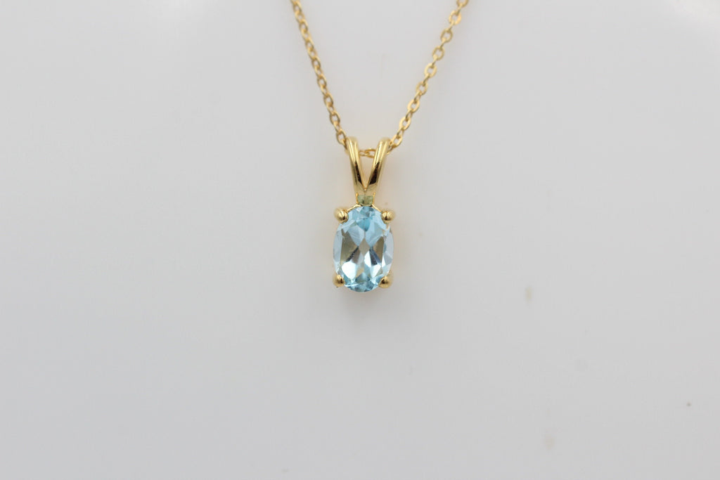 0,78 Carat leuchtender Blautopas Anhänger 925 Silber Collier Kette vergoldet