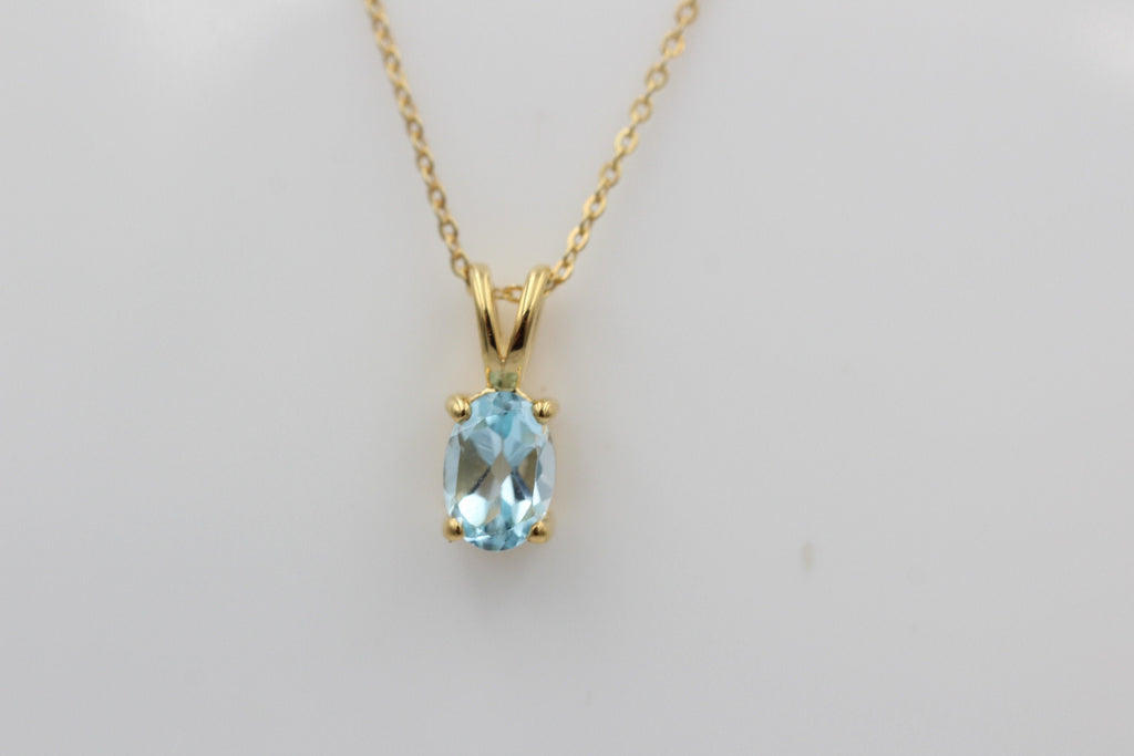 0,78 Carat leuchtender Blautopas Anhänger 925 Silber Collier Kette vergoldet