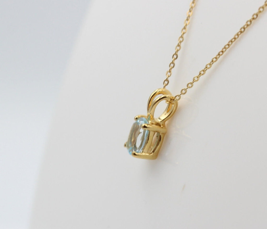 0,78 Carat leuchtender Blautopas Anhänger 925 Silber Collier Kette vergoldet