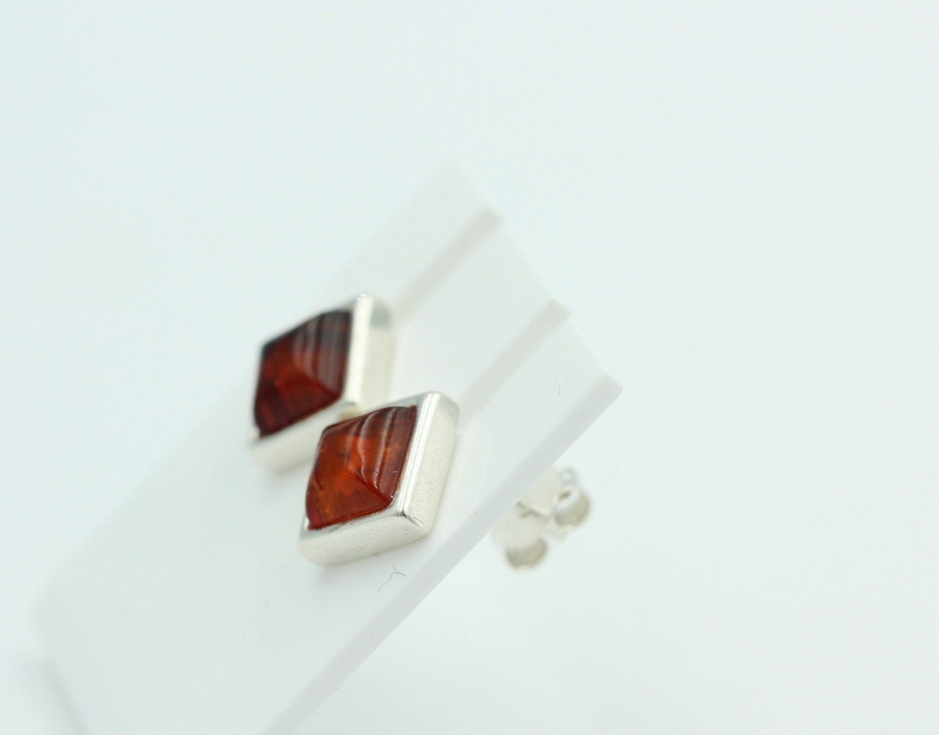 Bernstein Ohrstecker 7 x 7 mm aus 925 Sterlingsilber brauner Bernstein Unisex