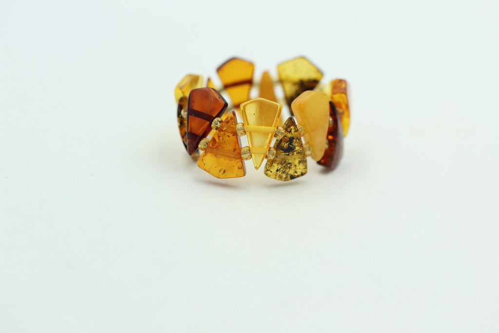 Bernstein Ring in verschiedenen Farben mit Gummiband aus Litauen