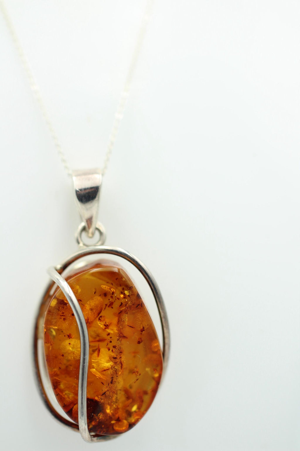 großer Bernstein Anhänger 925 Silber goldbrauner Bernstein Designschmuck