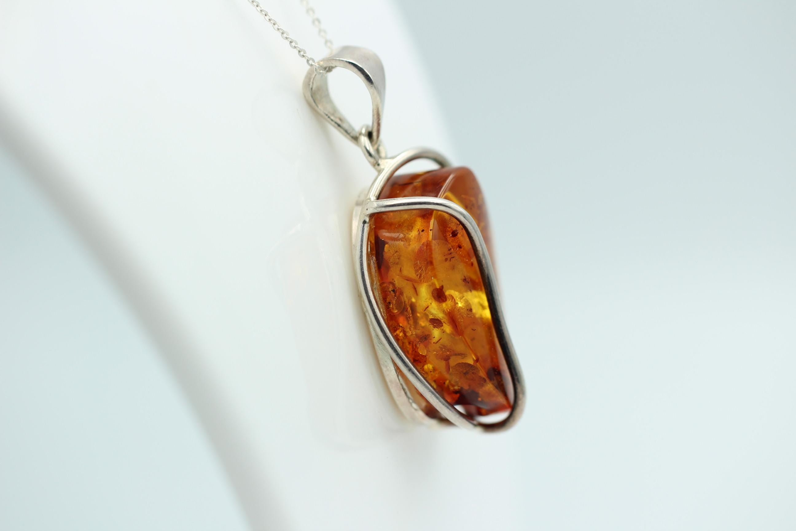 großer Bernstein Anhänger 925 Silber goldbrauner Bernstein Designschmuck