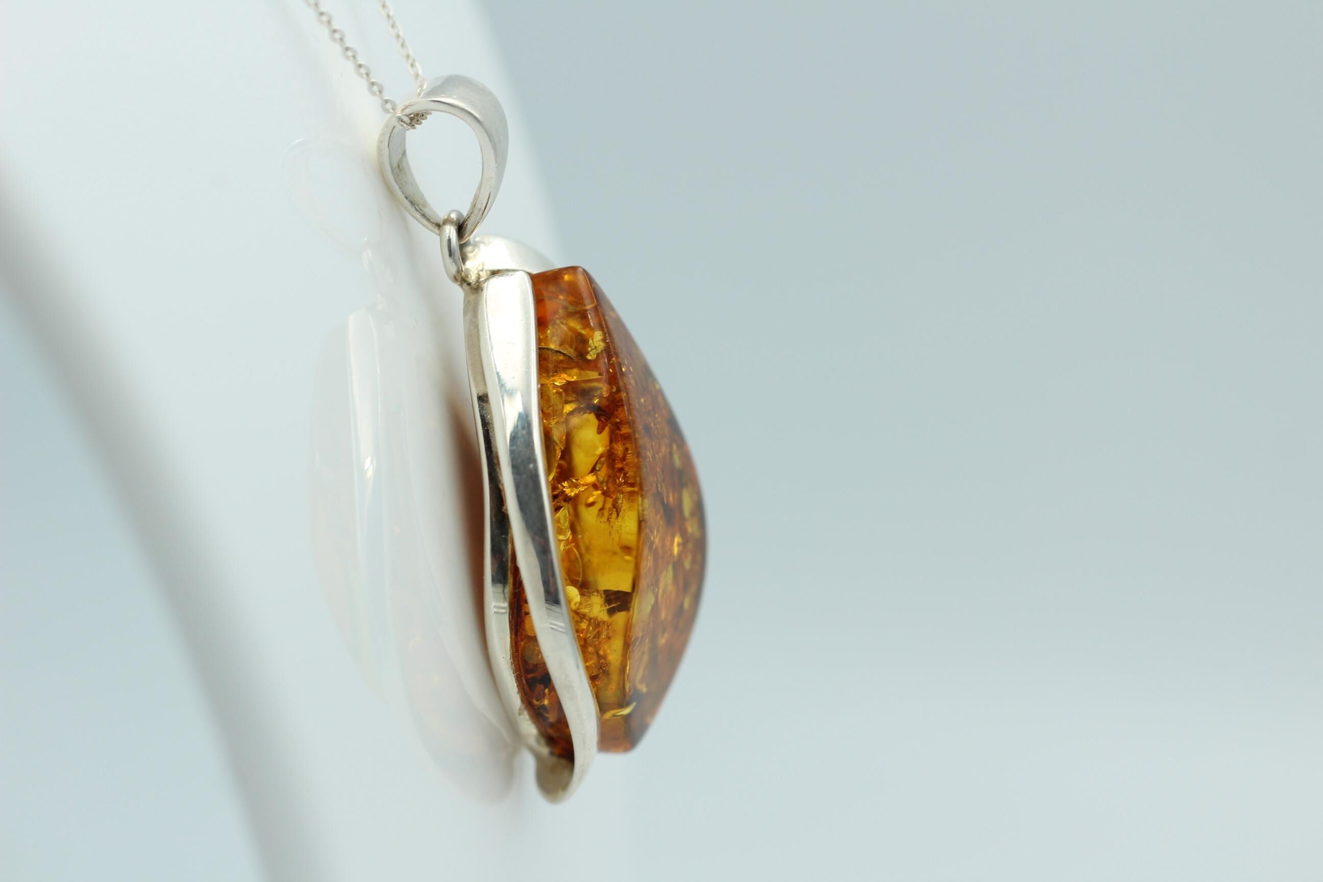 großer Bernstein Anhänger 925 Silber goldbrauner Bernstein Designschmuck