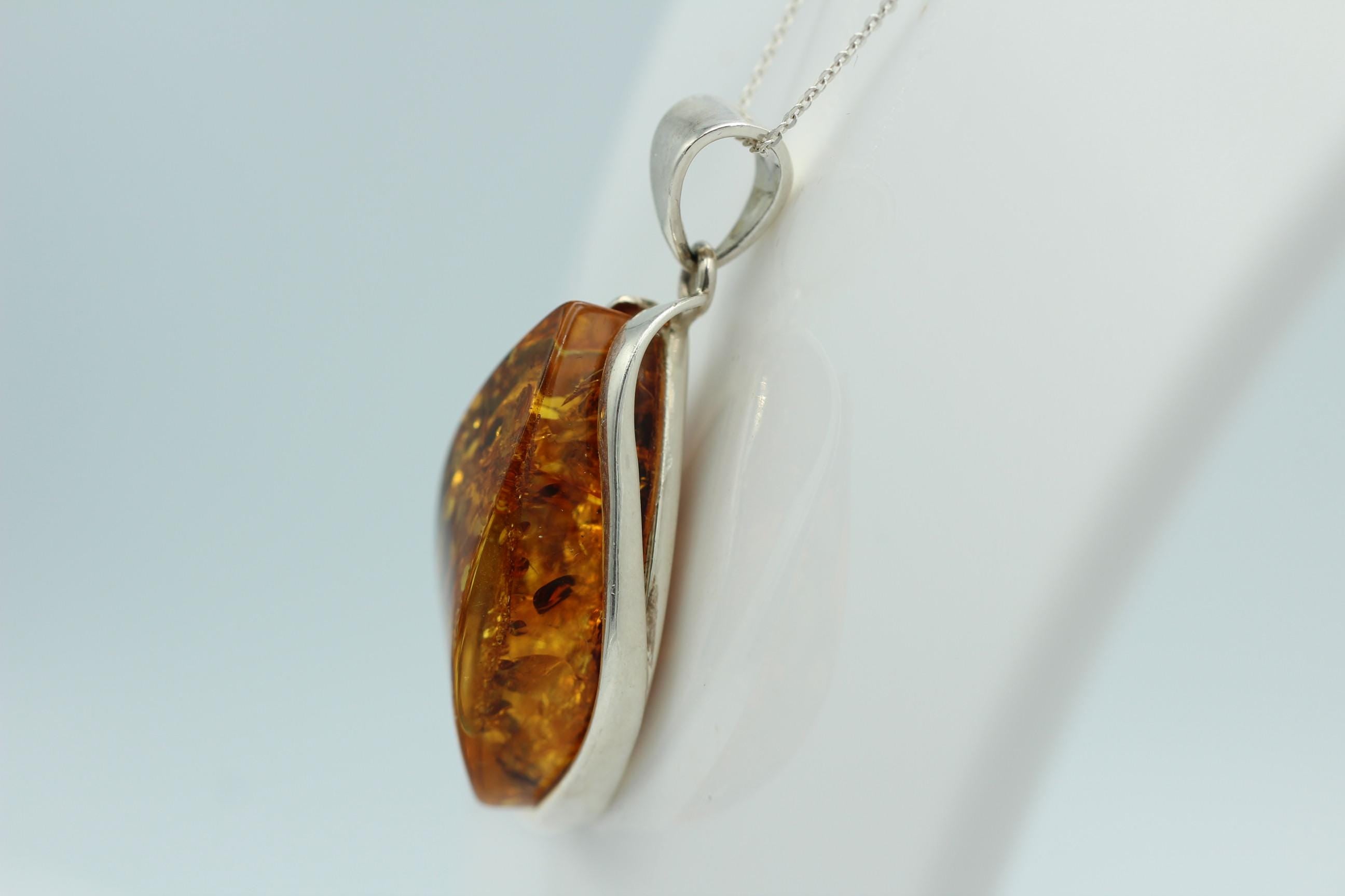großer Bernstein Anhänger 925 Silber goldbrauner Bernstein Designschmuck