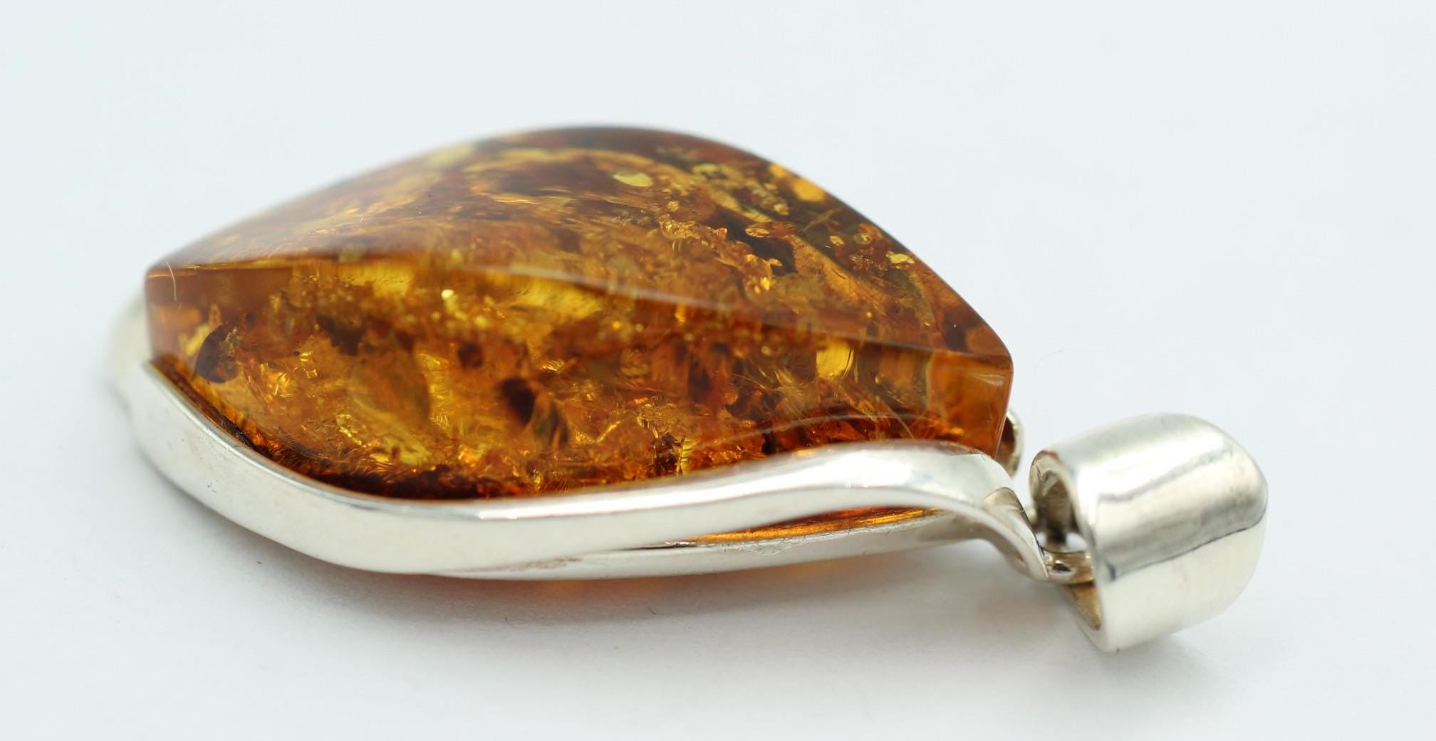 großer Bernstein Anhänger 925 Silber goldbrauner Bernstein Designschmuck