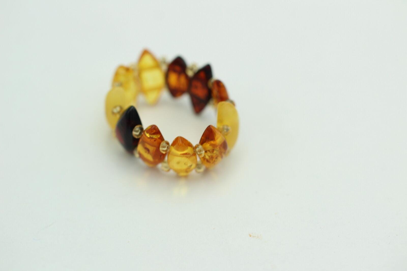 Bernstein Ring in verschiedenen Farben mit Gummiband aus Litauen
