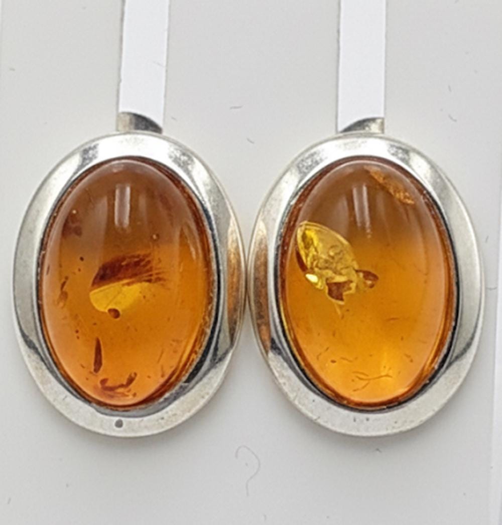 Bernstein Ohrstecker mit faszinierenden Inklusen in 925er Silber Elegant Ohrstecker vom Baltikum