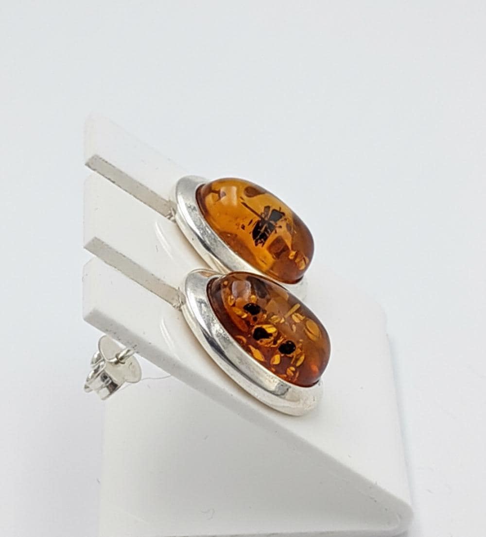 Bernstein Ohrstecker mit faszinierenden Inklusen in 925er Silber Elegant Ohrstecker vom Baltikum