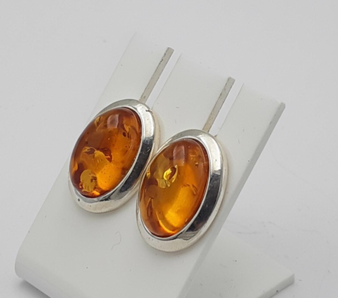 Bernstein Ohrstecker mit faszinierenden Inklusen in 925er Silber Elegant Ohrstecker vom Baltikum