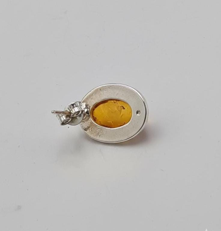 Bernstein Ohrstecker mit faszinierenden Inklusen in 925er Silber Elegant Ohrstecker vom Baltikum