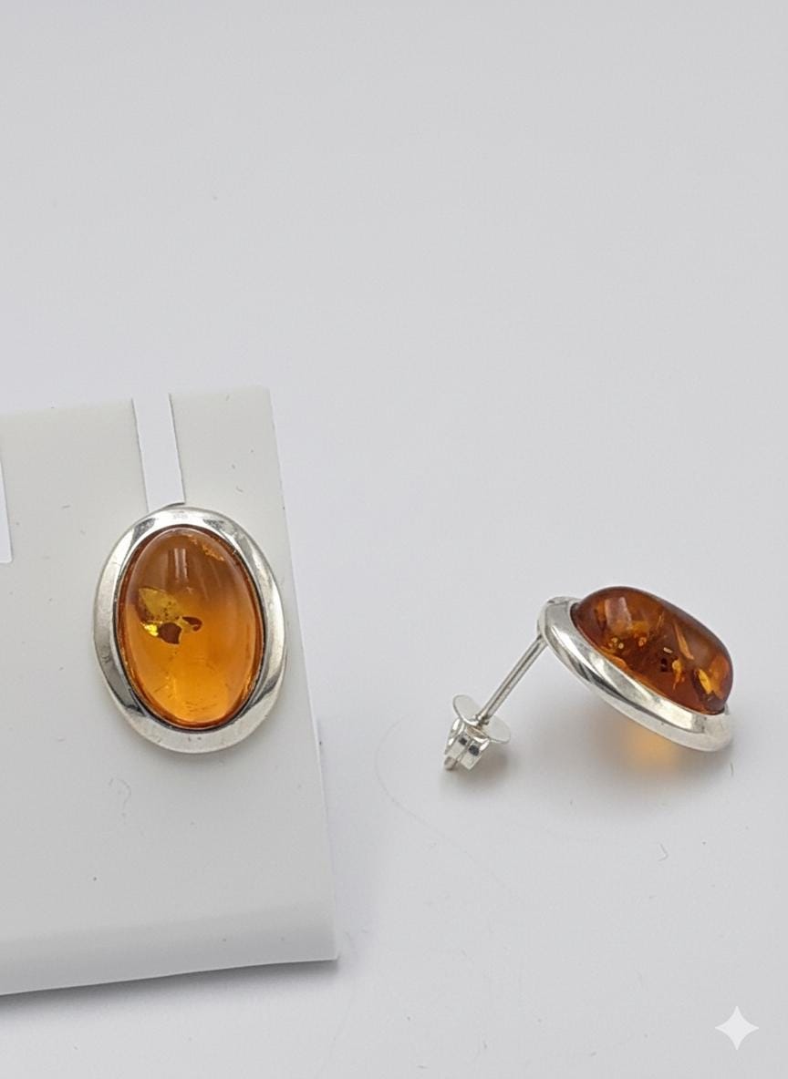 Bernstein Ohrstecker mit faszinierenden Inklusen in 925er Silber Elegant Ohrstecker vom Baltikum